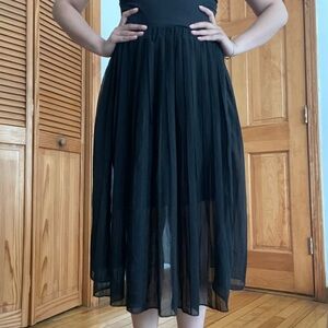 Pleated black midi skirt